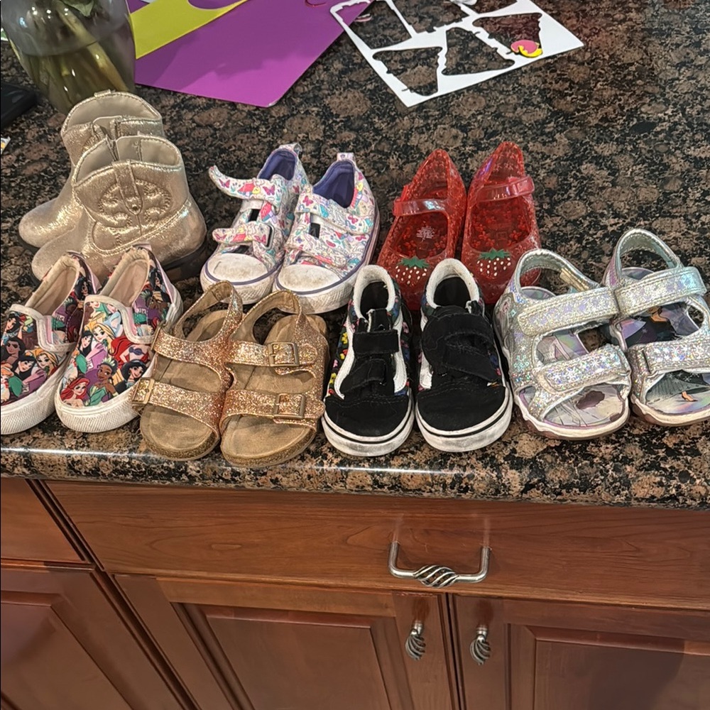 Lot is toddler size 7 shoes.    Converse, vans, target